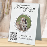 Pet Wedding Dog Photo Honeymoon Fund QR Code  Tischaufsteller<br><div class="desc">Let your best dog be in charge of your honeymoon with this custom pet photo honeymoon fund sign. Perfect for dog lovers, and a dog honeymoon fund will be a hit at your wedding. Simple modern white with black and white botanical eucalyptus leaves. "Our Parents Honeymoon Fund" Customize this pet...</div>