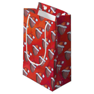 Petit Sac Cadeau Football à Santa Hat sur Rouge