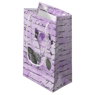 PETIT SAC CADEAU ROSE ARGENT NOIR ÉCRITURE ET BOUQUET À LA MAIN