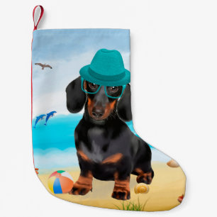 Petite Chaussette De Noël chien teckel sur la plage