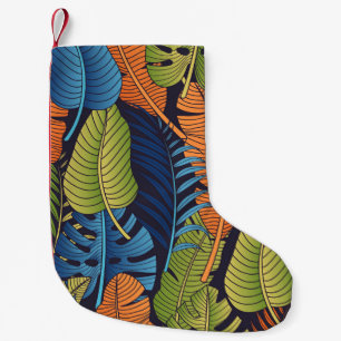 Petite Chaussette De Noël Feuilles tropicaux, motif sans couture fleurie.