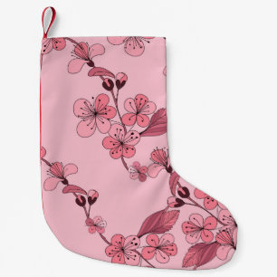 Petite Chaussette De Noël Fleur de cerisier rose sur arrière - plan blanc.