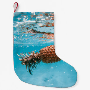 Petite Chaussette De Noël gouttelettes d'eau sur plante brun