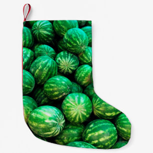 Petite Chaussette De Noël Many watermelons on the market background