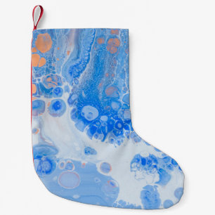 Petite Chaussette De Noël Méduse orange et blanche dans l'eau