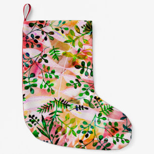Petite Chaussette De Noël Motif feuille tropical répétant. Photo artistique