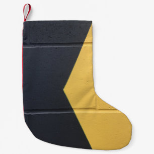 Petite Chaussette De Noël Mur de peinture noir et jaune