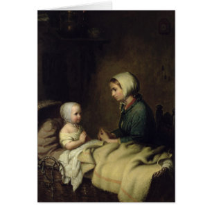 Petite fille disant ses prières dans le lit