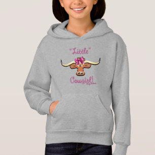 Petite fille, vache longhorne