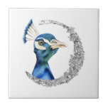 Pfau-silberner Glitzer-Mond Fliese<br><div class="desc">Dieses ist eine Aquarellmalerei eines Pfaus. Der Vogel hat schöne mischenfarben des Blaus und des Grüns. Der Vogel schaut sehr edel und stolz. Es gibt silbernen Glitterkreis des Imitats um den Vogel.</div>