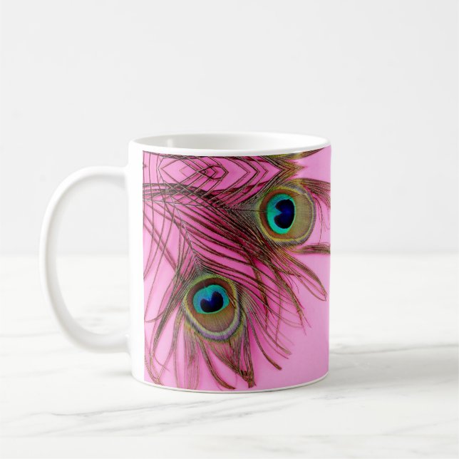 Pfau versieht Kaffee-Tasse mit Federn Kaffeetasse (Links)