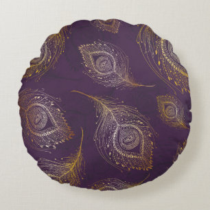 Pfauenfeder aus Gold, violetter Hintergrund. Rundes Kissen