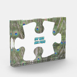 Pfauenfedern Puzzle-Piece-Kust. Fotoblock