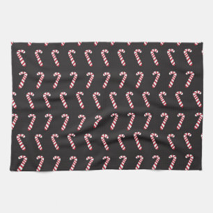 Pfefferminz-Zuckerstangen auf Schwarzem Handtuch