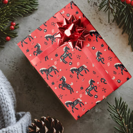 Pferde mit blumengeschmückten Ornamenten auf rotem Geschenkpapier