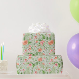 Pfirsichrosen und Hibiskus auf grünem Geschenkpapi Geschenkpapier