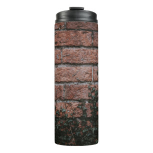Pflanze mit grüner Blattfarbe in der Nähe der Back Thermosbecher