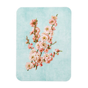 Pflaumenblüten auf gealtertem Denim Magnet