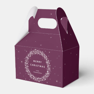 Pflaumenfarbene Weihnachtsbotschaft mit funkelnden Geschenkschachtel