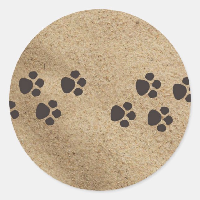 Pfotendrucke im Sand Runder Aufkleber (Vorderseite)