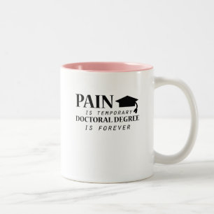 Phd-Schmerz sind der vorübergehende lustige Zweifarbige Tasse