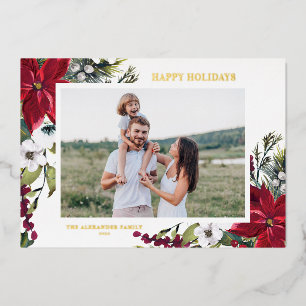 Photo de vacances joyeuses avec poinsettia et feui
