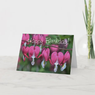 Photo du coeur saignant sur la carte d'anniversair
