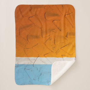 Photo of orange, white, and blue artwork sherpadecke