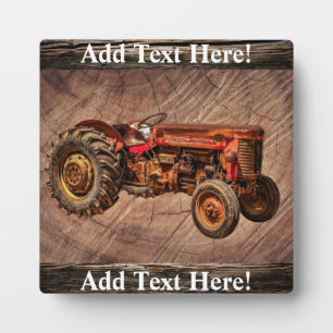 Photo Plaque de tracteur rouge antique