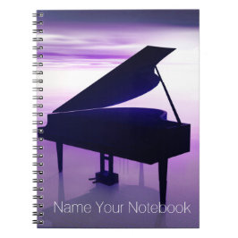 Piano à queue sur le carnet de musique de plage de