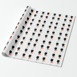 Pickleball-Paddel und orangefarbenes Pickleball Geschenkpapier