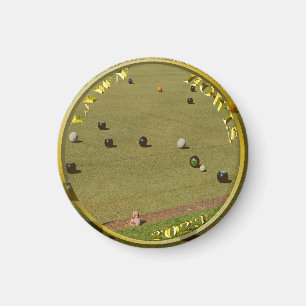 Pièce de monnaie et aimant conçus pour les boules