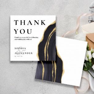 Pierre grise foncée avec carte de remerciements or