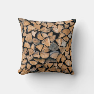 Pile of brown firewood kissen