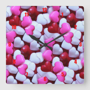 Pile of Candy Hearts Quadratische Wanduhr