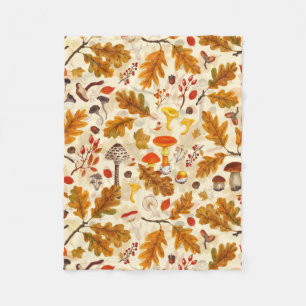 Pilze und Herbstflora auf Sahne Fleecedecke