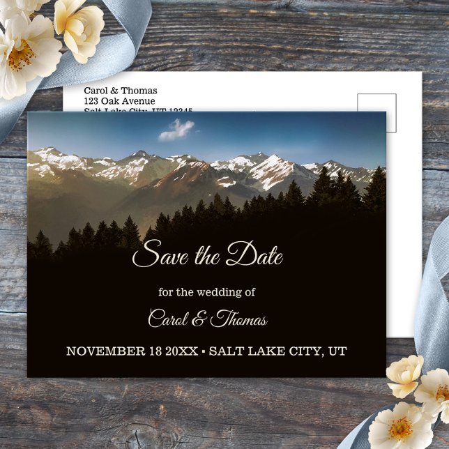 Pine Tree Mountains Save the Date Postcard Ankündigungspostkarte (Save the Date postcard featuring a painting of pine trees with snow capped mountains)