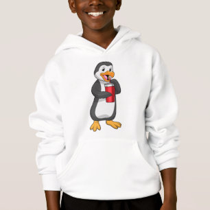 Pingouin avec tasse à boire avec paille