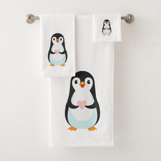Pingouin mignon tenant un coeur sur blanc (En situation)