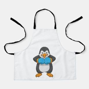 Pinguin beim Boxen mit Boxhandschuhen Schürze