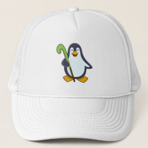 Pinguin im Hockey mit Hockey-Schläger Truckerkappe