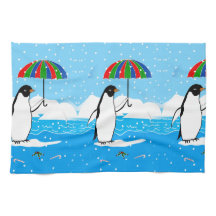 Pinguin im Schnee auf Geschirrtuch