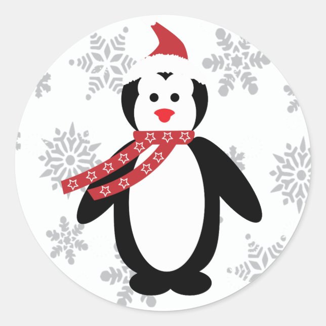 Pinguin im Schnee mit Hut des Weihnachtsmanns auf  Runder Aufkleber (Vorderseite)