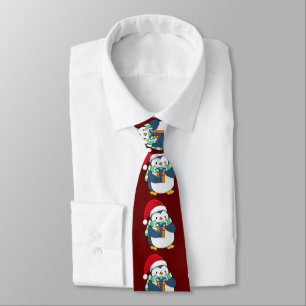 Pinguin in einem Weihnachtshut mit Geschenk Krawatte