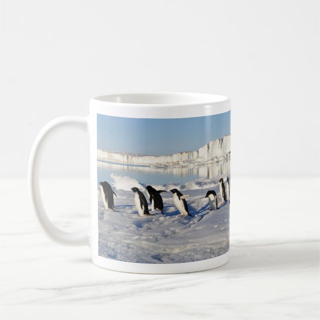 Pinguine in der Schnee-Tasse Kaffeetasse (Links)