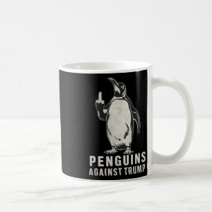 Pinguinflossen hoch Mittelfinger Pinguine gegen Kaffeetasse