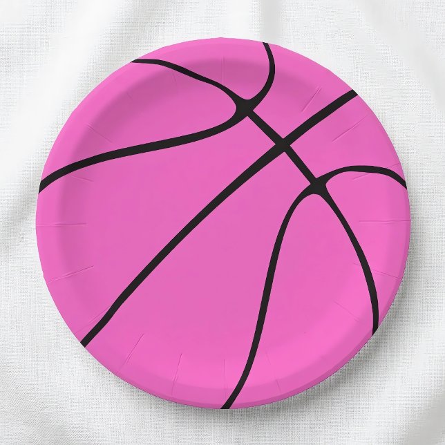 Pink Basketball Teller (Pink basketball paper plates for basketball parties and celebrations, on a white tablecloth.)