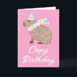 Pink Cape Birthday Funny Capybara Lover Card Karte<br><div class="desc">Eine lustige Karte mit einer Abbildung einer Capybara mit einem pastellrosa, blauen und gelben Geburtstagshut und Schal, mit dem Pun Capy Birthday unten. Das Innere lautet: "Wünschen Sie einen besonderen Tag voll mit all den Dingen, die Sie Liebe. Alles Gute zum Geburtstag!"</div>