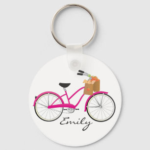 Pink-Fahrrad mit Orangen Schlüsselanhänger