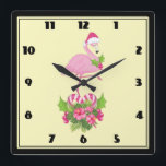 Pink Flamingo in der Weihnachtsmannmütze Whimsisch Quadratische Wanduhr<br><div class="desc">Eine Uhr mit einem tropischen Thema Weihnachtsbramingo mit einer rosa Weihnachtsmannmütze. Unter den Füßen befindet sich ein Bonbons mit hübschen tropischen Blume und rosa Beeren. Ein Zwerg Heiliger auf der Brust.</div>